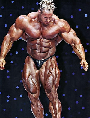Jay Cutler Bodybuilding Stage Pose with Intense Muscle Definition and Tanned Skin HD phone wallpaper