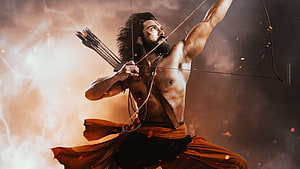 RRR Alluri Sitarama Raju Archery Action Scene with Bow and Arrows HD wallpaper