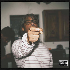 Juice Wrld Pointing Directly at Camera in Striped Shirt with Parental Advisory Label HD phone wallpaper
