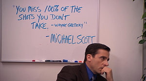 Michael Scott in front of whiteboard with motivational quote from The Office HD wallpaper
