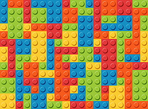 Colorful Lego Brick Pattern Background with Vibrant Red Blue Green and Yellow Blocks HD wallpaper