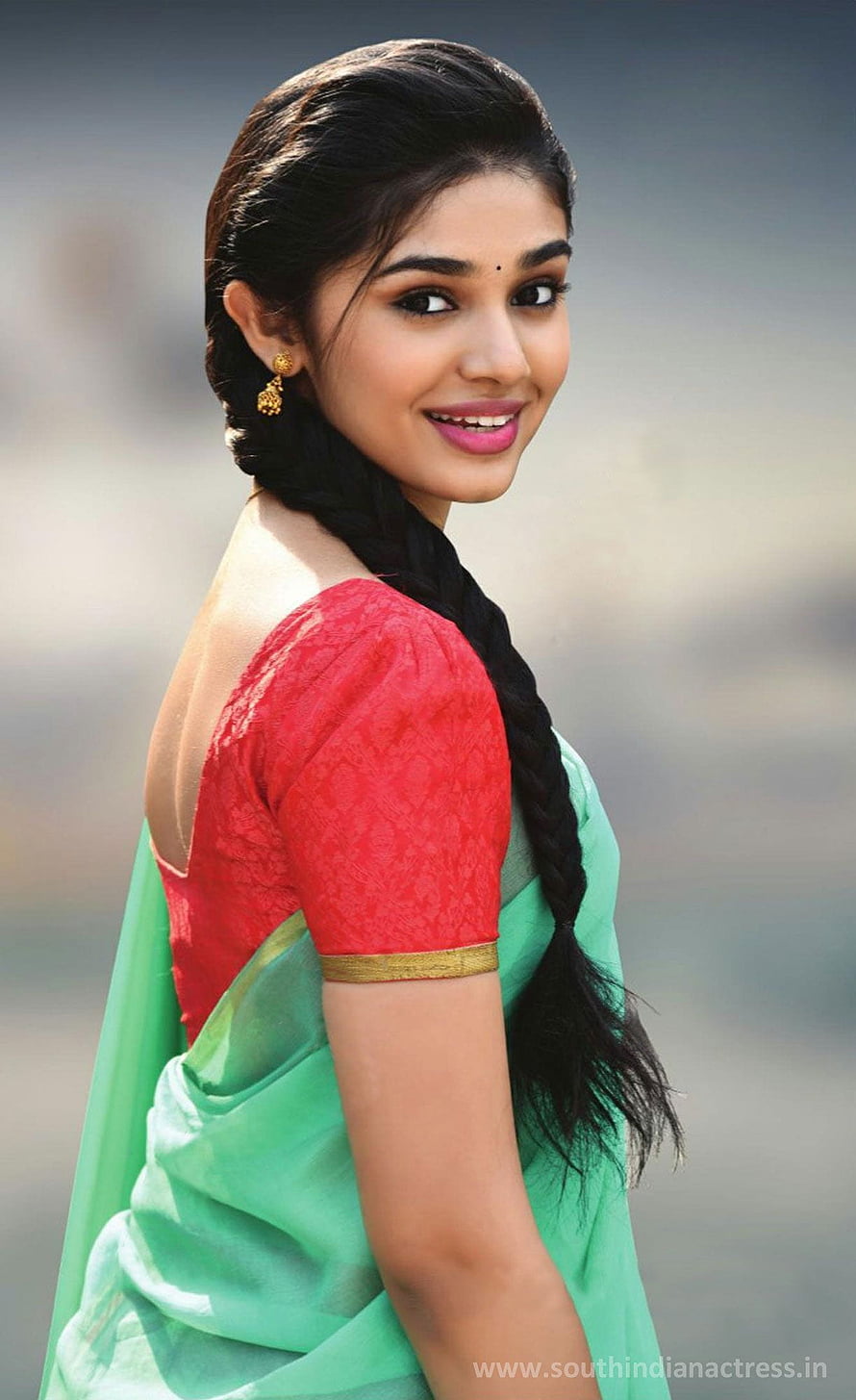 Krithi Shetty in Green Saree and Red Blouse with Long Braid HD phone wallpaper