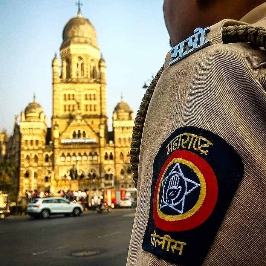 Maharashtra Police Officer Uniform Patch in Front of Mumbai's Chhatrapati Shivaji Terminus HD phone wallpaper