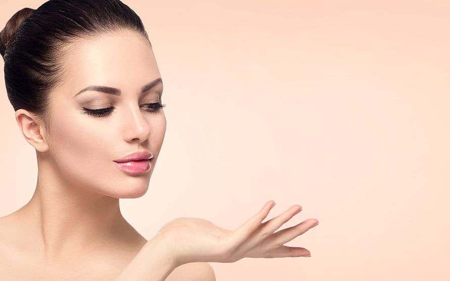 Elegant Beauty Portrait of a Woman with Flawless Skin and Soft Makeup HD wallpaper