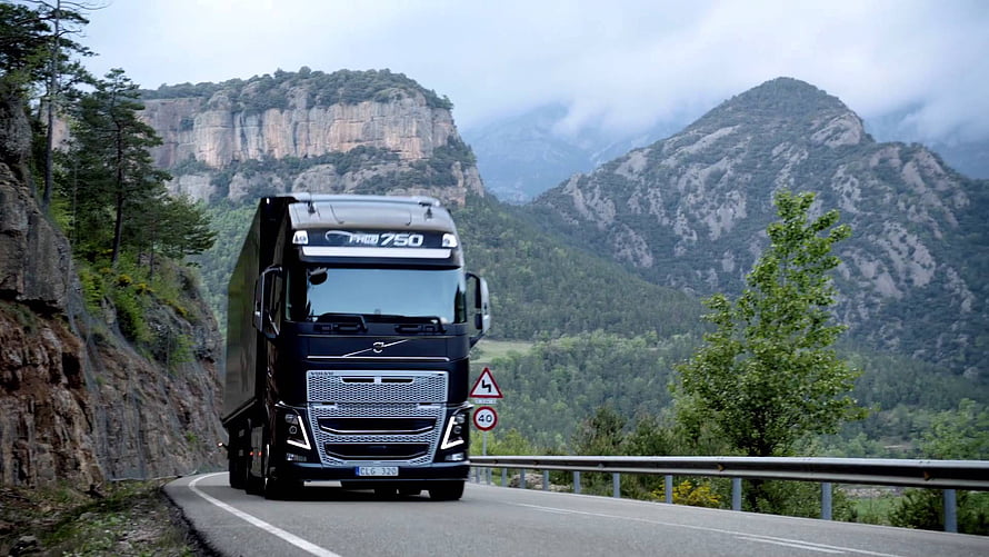 Volvo FH16 750 Heavy Duty Truck Driving on a Scenic Mountain Road HD wallpaper