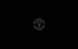 Manchester United Official Club Crest Emblem on Black Background HD wallpaper