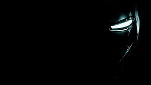 Iron Man Helmet Close-Up in Dark Cinematic Lighting HD wallpaper