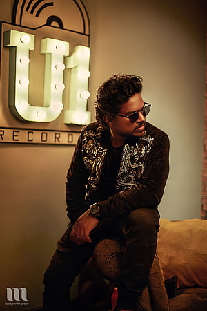 Yuvan Shankar Raja in a Sequined Jacket and Sunglasses at a U1 Records Studio HD phone wallpaper