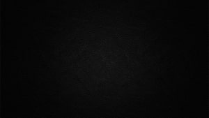 Dark Textured Leather Surface with Subtle Grain Pattern and Minimalist Aesthetic HD wallpaper