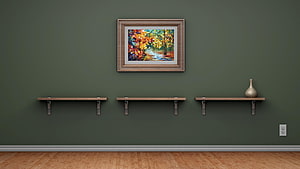 Minimalist interior with floating wooden shelves and framed autumn landscape painting on a dark green wall HD wallpaper