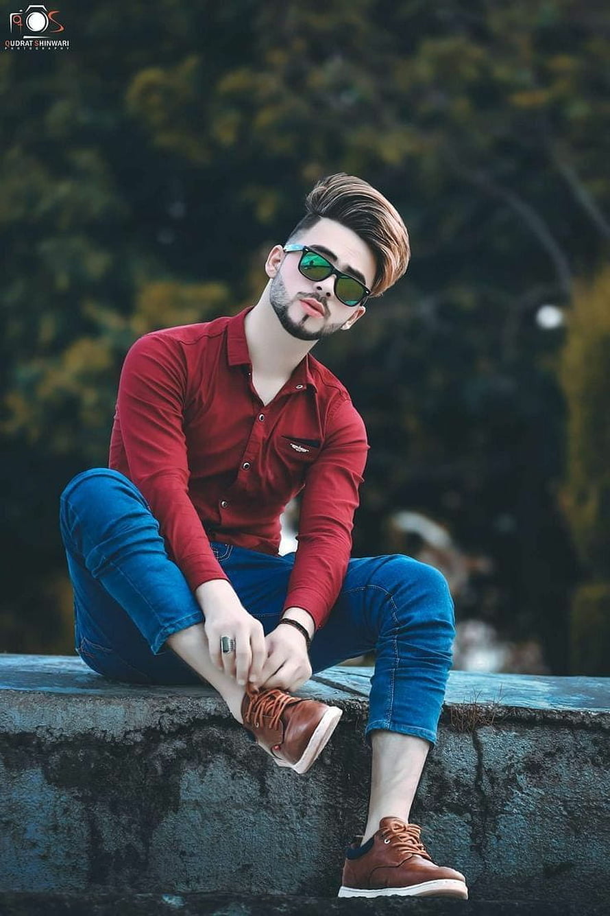 Stylish Young Man in Red Shirt and Sunglasses Sitting on Stone Wall HD phone wallpaper