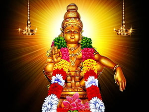 Golden Lord Ayyappa Statue Adorned With Flower Garlands And Radiant Divine Light HD wallpaper