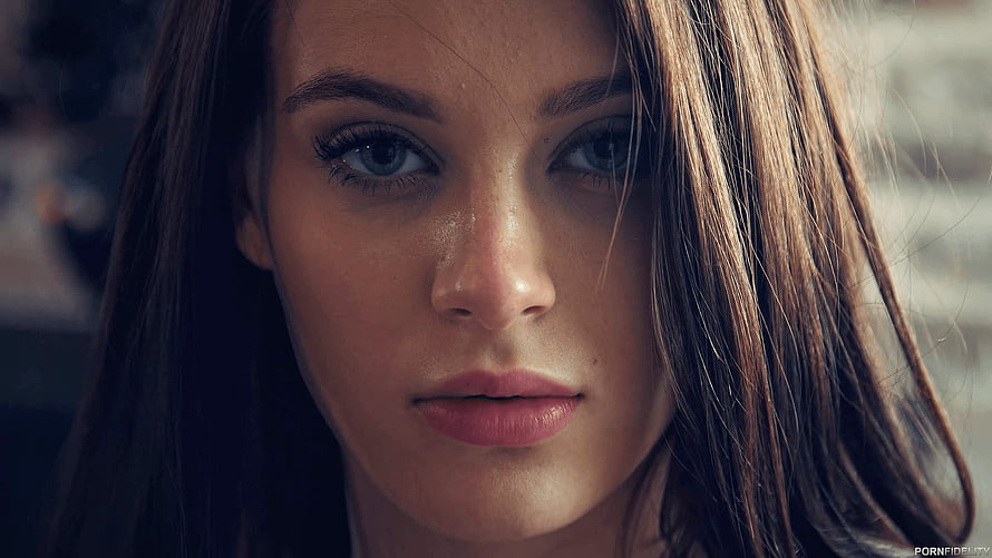 Lana Rhoades Close-Up Portrait with Long Brown Hair and Intense Blue Eyes HD wallpaper