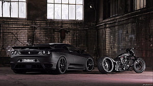 Matte Black Ferrari F430 and Custom Chopper Motorcycle in Industrial Warehouse HD wallpaper