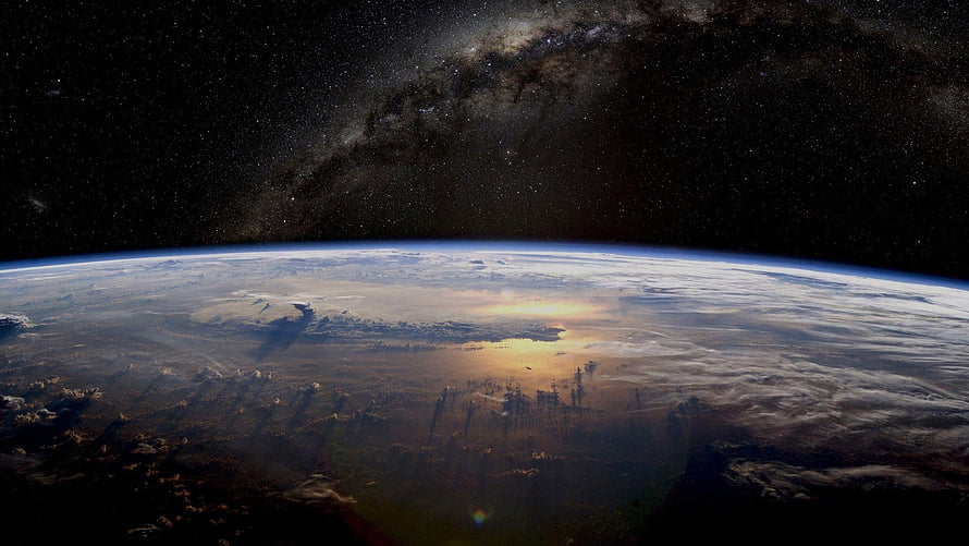 Earth Horizon From Space With Milky Way Galaxy And Sunlight Reflection HD wallpaper