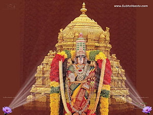 Perumal Deity Adorned in Gold Temple Architecture with Vibrant Floral Garlands HD wallpaper