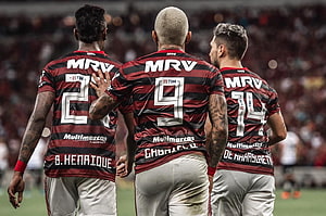 Flamengo Players Bruno Henrique, Gabigol, and Arrascaeta Walking on the Pitch HD wallpaper