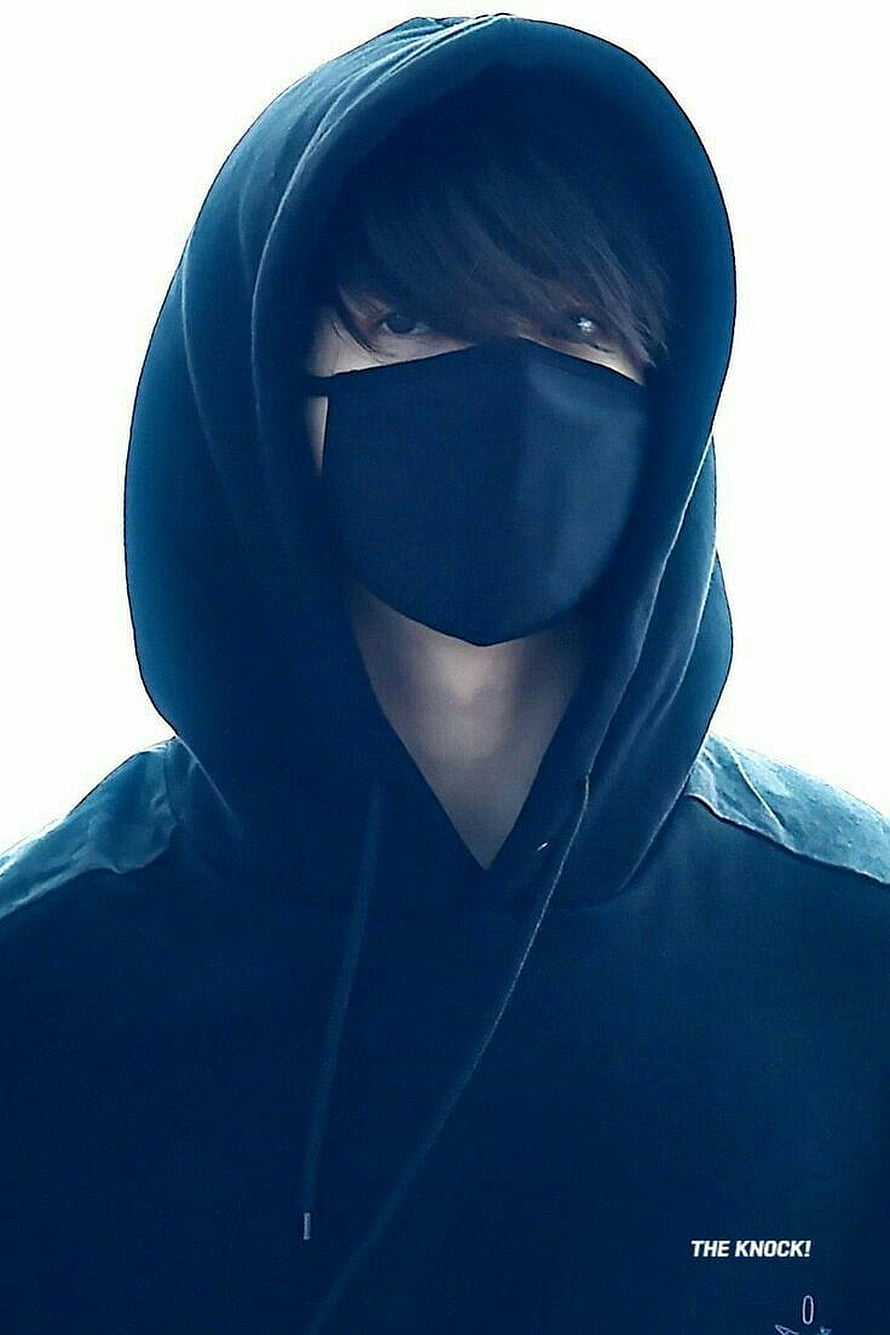 Mysterious Young Man in Dark Hoodie and Face Mask Against White Background HD phone wallpaper