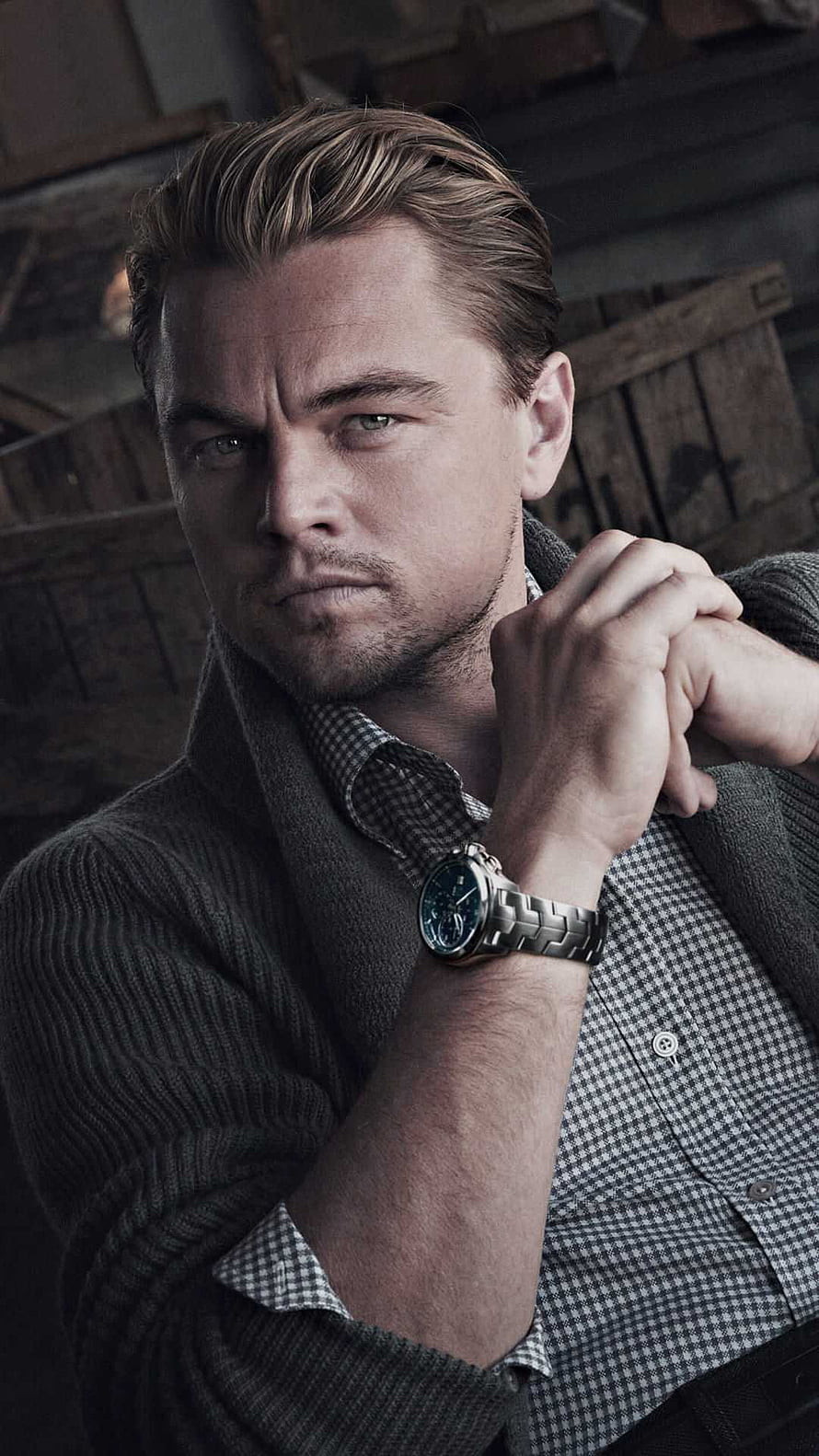 Leonardo DiCaprio in a moody portrait wearing a wristwatch and checkered shirt HD phone wallpaper