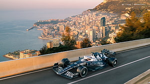 Alfa Romeo F1 Car Driving Through Monaco Cityscape at Golden Hour HD wallpaper