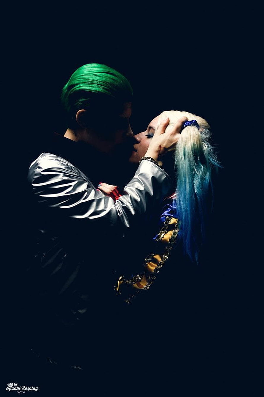 Joker and Harley Quinn Intimate Embrace in Dramatic Dark Cosplay Portrait HD phone wallpaper
