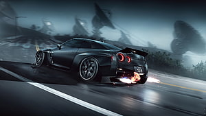 Nissan GT-R R35 drifting on a dark wet road with exhaust flames and motion blur HD wallpaper