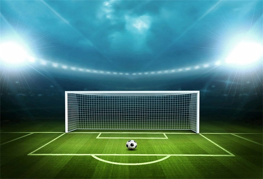 Illuminated Soccer Goal and Ball on a Green Pitch Under Stadium Floodlights HD wallpaper