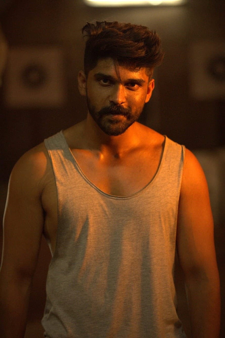 Vikram Mahaan Intense Portrait in Grey Tank Top with Dramatic Warm Lighting HD phone wallpaper