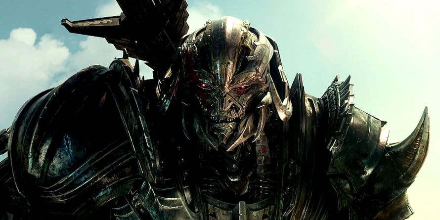 Megatron from Transformers The Last Knight with glowing red eyes and dark metallic armor HD wallpaper
