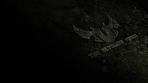ASUS TUF Gaming Series Emblem on Dark Textured Background HD wallpaper