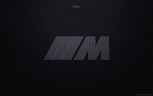 BMW M Power Carbon Fiber Emblem on Dark Textured Background HD wallpaper