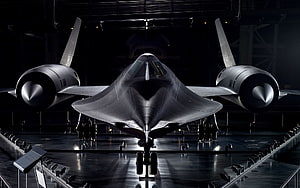 F-117 Nighthawk Stealth Fighter Front View in Hangar HD wallpaper