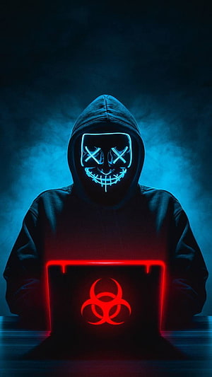 Hacker in Glowing Neon Mask with Biohazard Laptop in Dark Smoky Room HD phone wallpaper