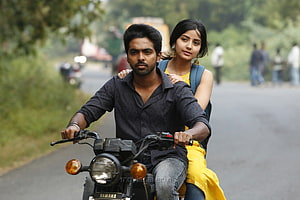 Sivappu Manjal Pachai Movie Still: Couple Riding a Yamaha Motorcycle on a Countryside Road HD wallpaper