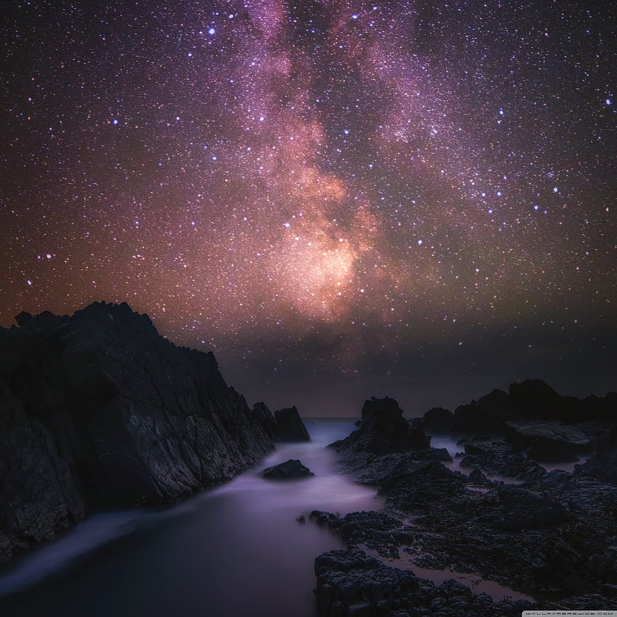 Milky Way Galaxy Arching Over Rocky Coastline at Night HD phone wallpaper