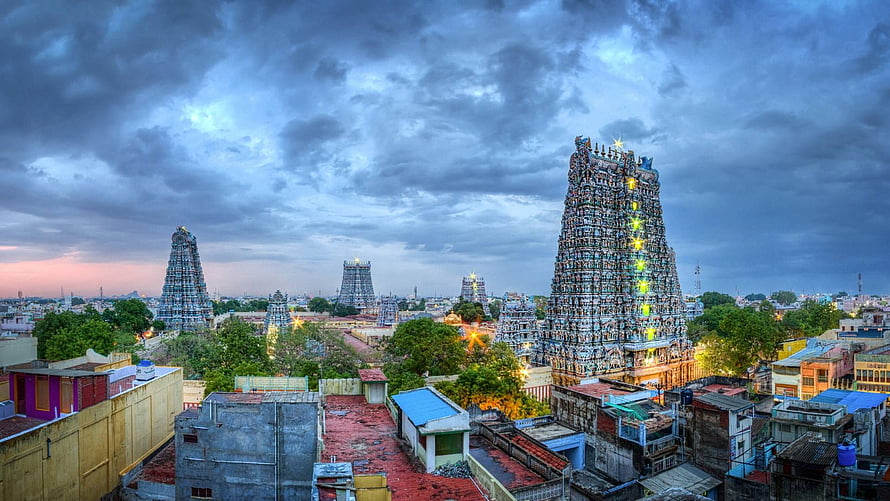 Madurai Meenakshi Amman Temple Gopurams at Dusk with Dramatic Clouds HD wallpaper