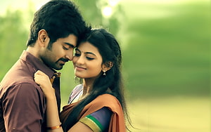 Romantic Tamil Couple Embracing in Lush Green Garden Setting HD wallpaper