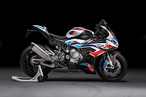 BMW M 1000 RR Superbike in M Motorsport Livery on Rear Stand HD wallpaper