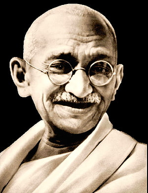 Mahatma Gandhi Portrait in Traditional Dhoti and Round Glasses HD phone wallpaper