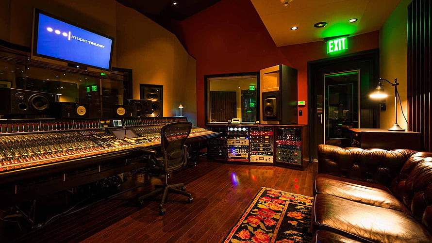 Professional Music Recording Studio Control Room With Mixing Console And Leather Sofa HD wallpaper