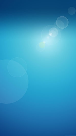 Abstract Blue Gradient with Soft Lens Flare and Bokeh Light Circles HD phone wallpaper