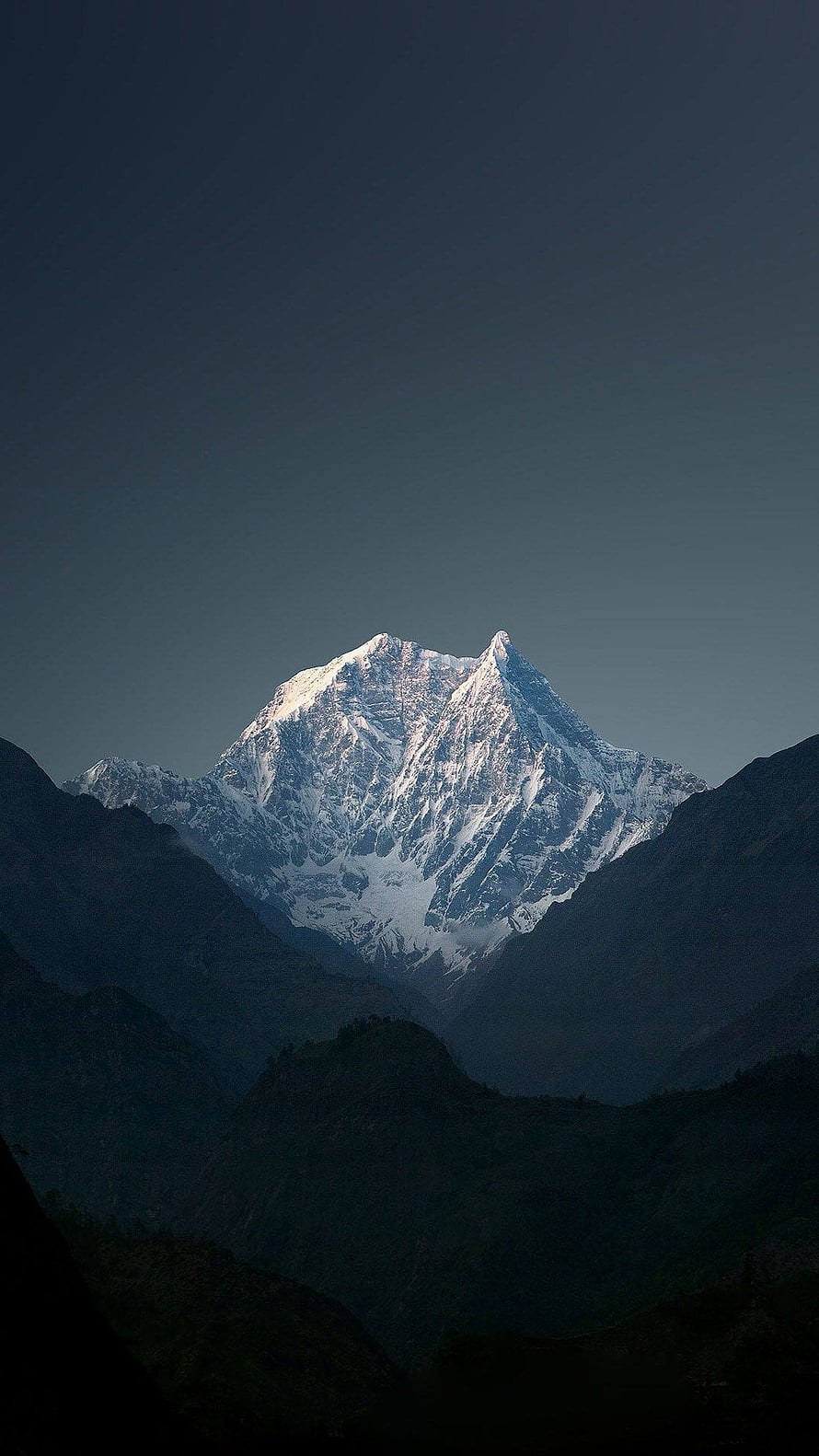 Mount Kailash Snow-Capped Peak Rising Above Dark Rugged Valleys at Dawn HD phone wallpaper