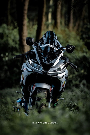 Yamaha R15 V3 sport bike parked in a dark forest with moody lighting HD phone wallpaper