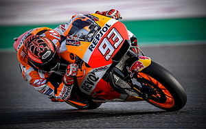 Marc Marquez Leaning Into a Corner on Repsol Honda MotoGP Bike HD wallpaper