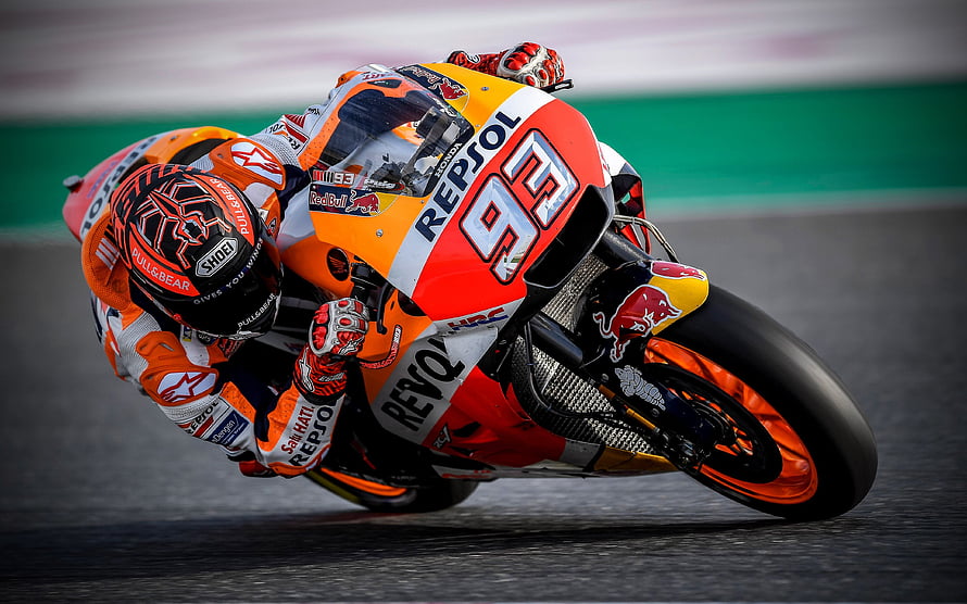 Marc Marquez Leaning Into a Corner on Repsol Honda MotoGP Bike HD wallpaper
