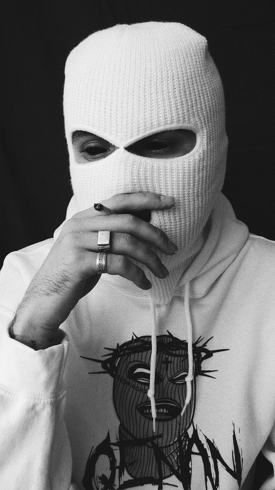 Black and white portrait of a person wearing a white ski mask and graphic hoodie HD phone wallpaper