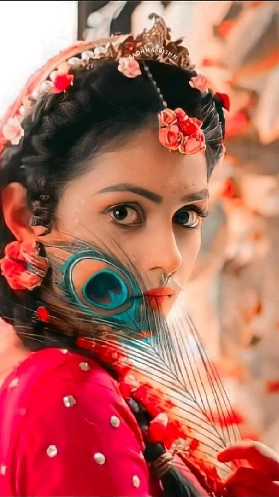 Mallika Singh as Radha in Traditional Attire with Peacock Feather and Floral Hairpiece HD phone wallpaper