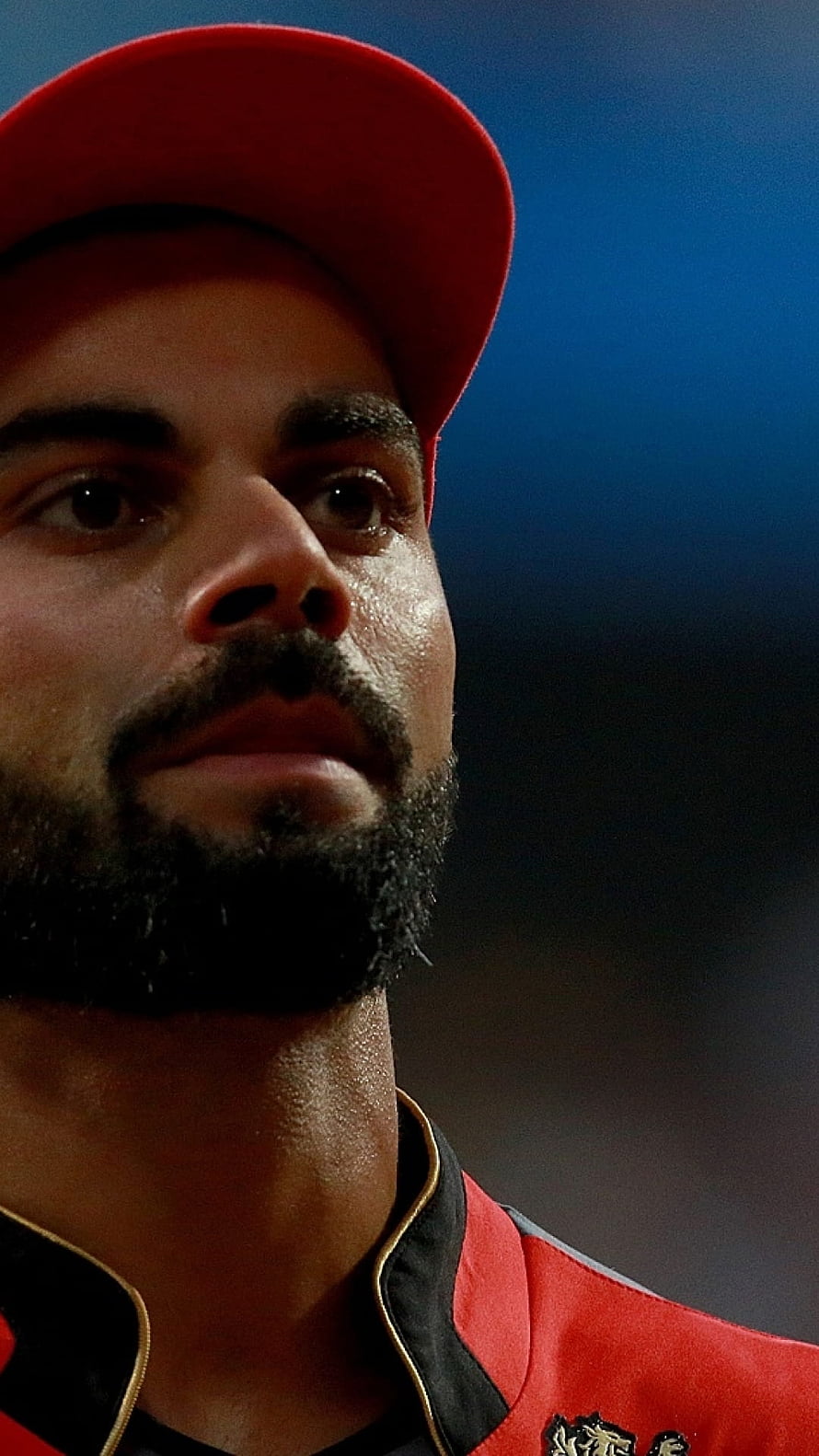 Virat Kohli in Royal Challengers Bengaluru Red Jersey and Cap Close-Up Portrait HD phone wallpaper