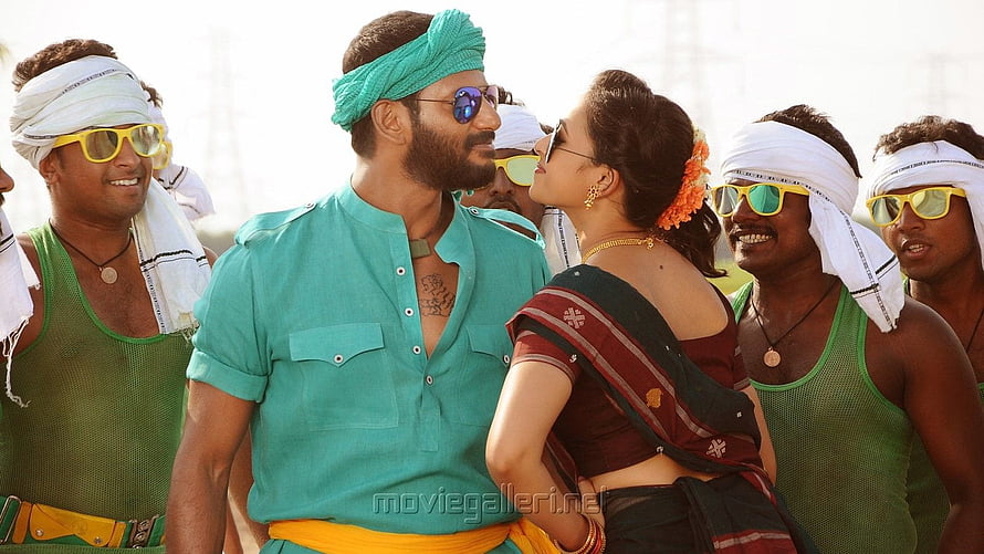 Maruthu Movie Still Featuring Lead Actors in Vibrant Traditional Attire HD wallpaper