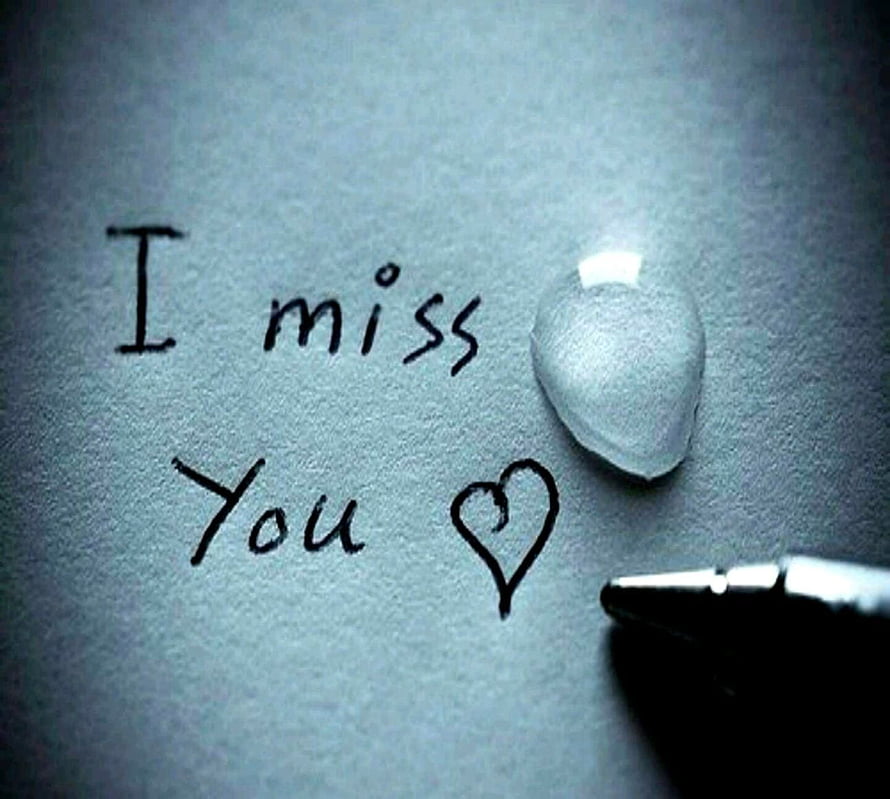Handwritten I Miss You Note with Heart and Pen on Textured Paper HD wallpaper